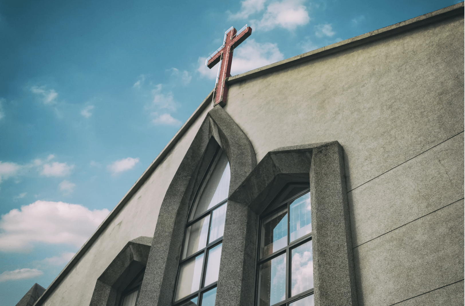 A church with a cross on top of it, raising awareness about spiritual abuse. A church with a cross on top of it, raising awareness about spiritual abuse.
